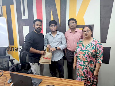 upGrad Kanpur office - student and parents with the counselling team after their study abroad session